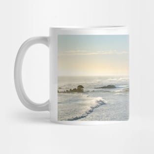 Hazy atmosphere caused by Cyclone Cody's large waves and swells at Mount Maunganui, New Zealand. Mug